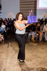 Purse model Laura Whitley at the Power of the Purse fundraiser benefiting Women's Resource. (Photo by Quy Tran)