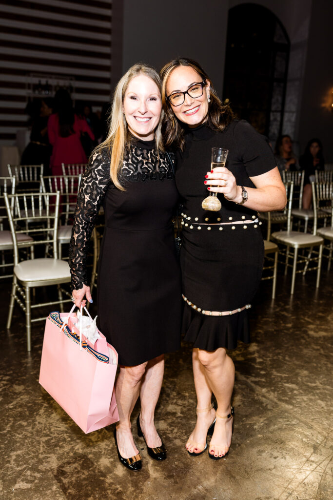 Kelly Harred, Joni Lipkowski  at the Power of the Purse fundraiser benefiting Women's Resource.