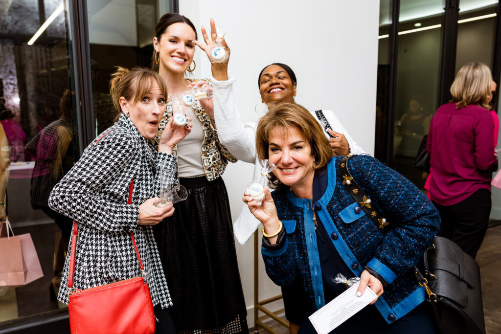 Girls are just having fun at the Power of the Purse fundraiser benefiting Women's Resource.