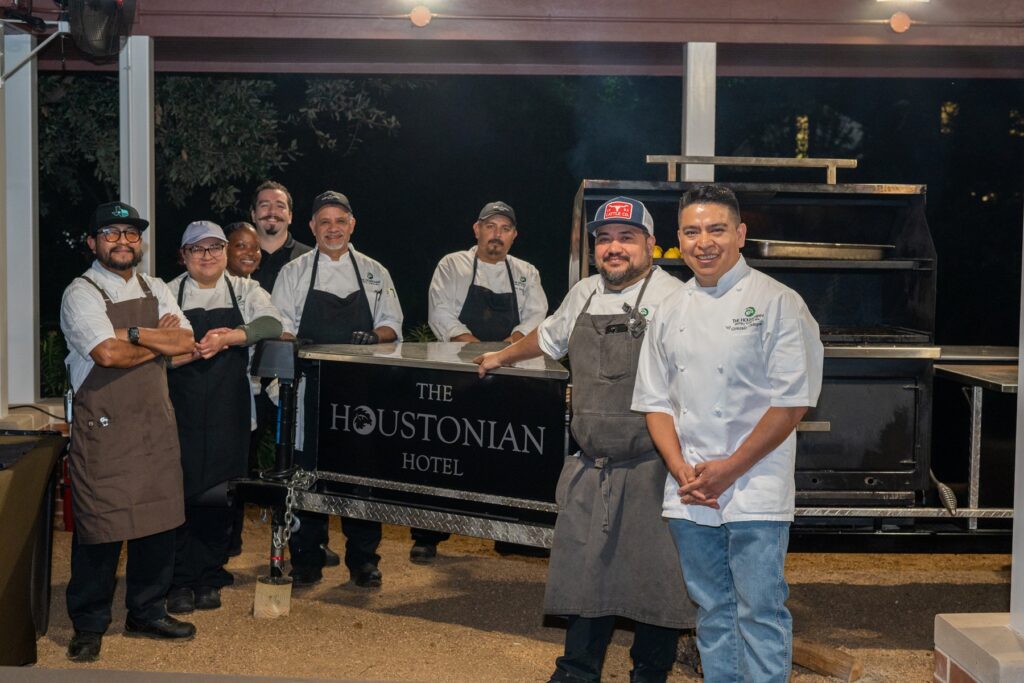 The Houstonian culinary team presenting live fire fall favorites from the hotel's Big Sam barbecue pit (Photo by Katy Cartland Photography)