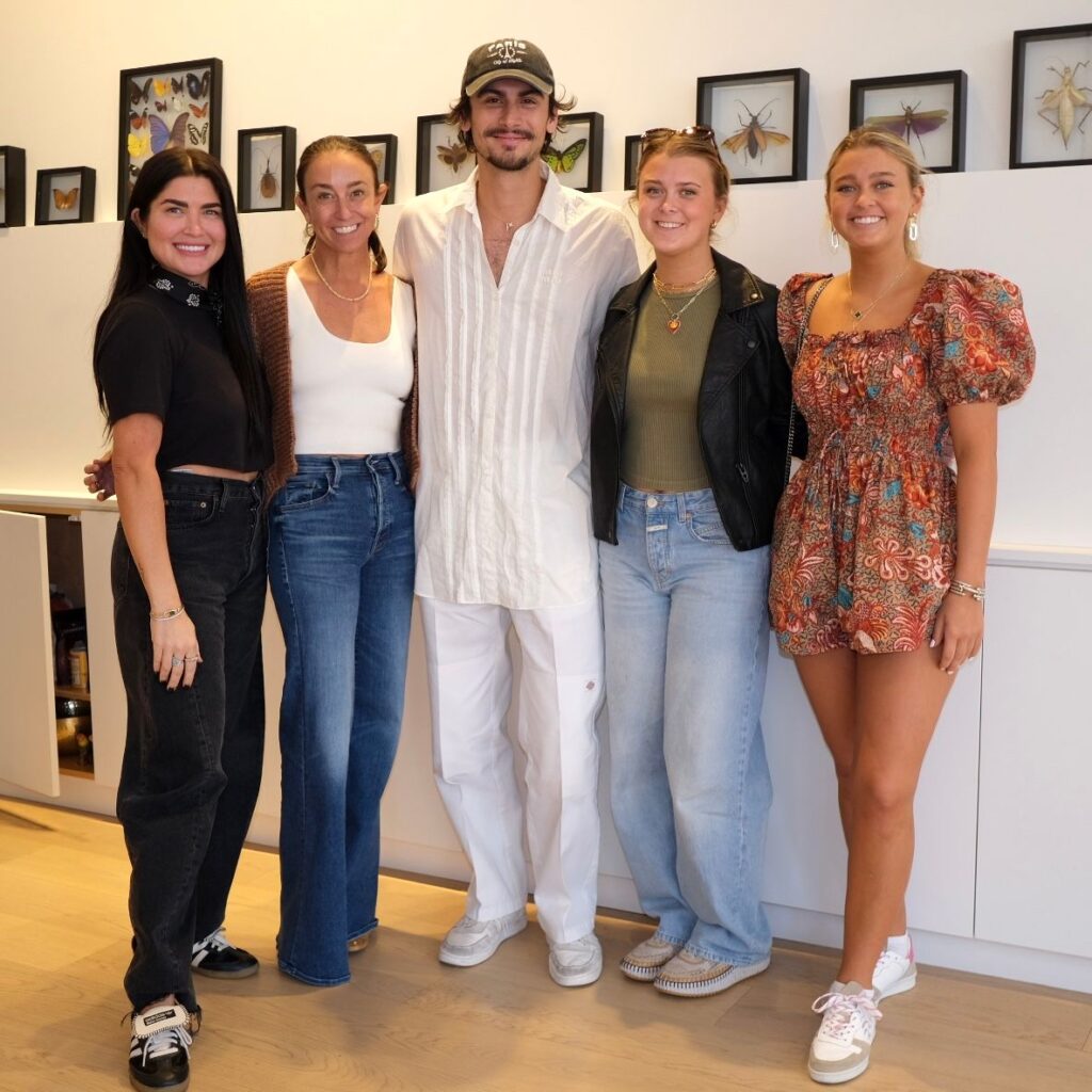 Stylist Bonnie Thompson Smith, Kara Bell, Emily Kate Bell, and Conally Bell pose with designer Christian Cowan. (Photo by Beth Hutson)