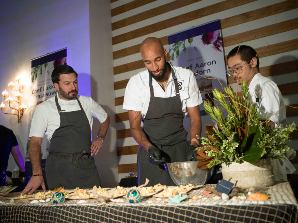 Chef Aaron Bludorn and his team put care into their dishes at March of Dimes Signature Chefs.  (Photo by Daniel Ortiz)