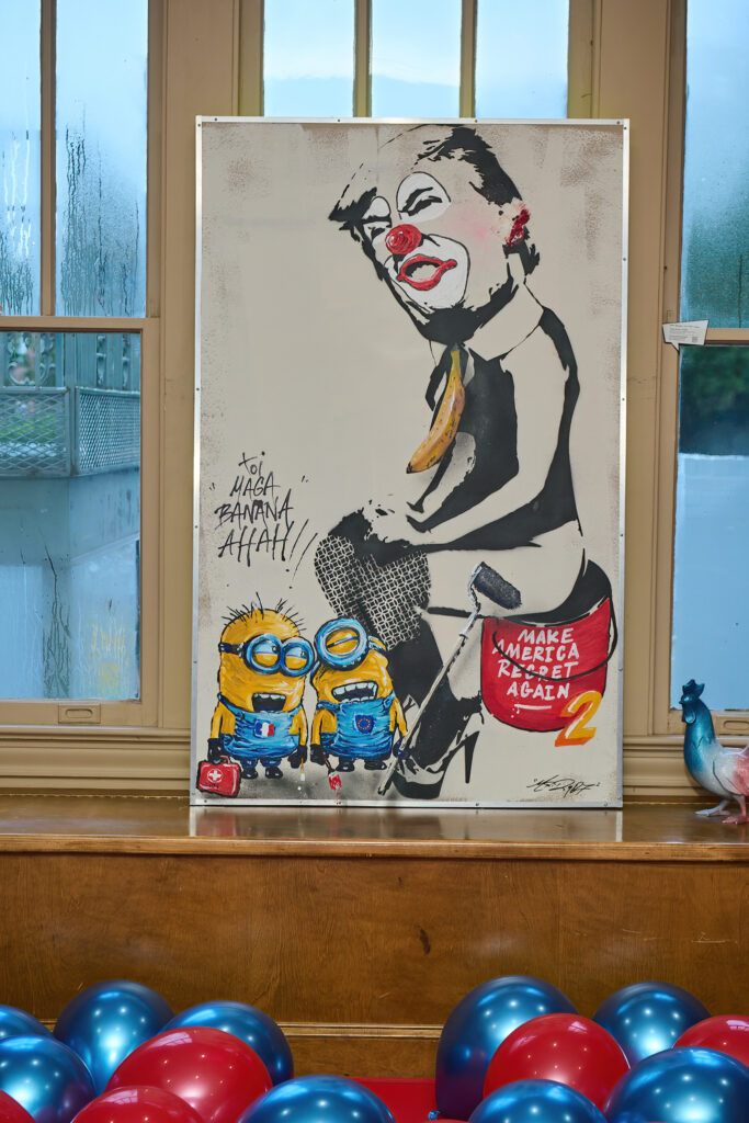 "MAGA Banana," 2024, is on view at Alliance Francaise de Houston. Disclaimer: Alliance Francaise support artists and their rights to express themselves. The content of this exhibition reflects the artist’s vision and is not an endorsement by Alliance Francaise (Photo by Charlie Horse Photography)