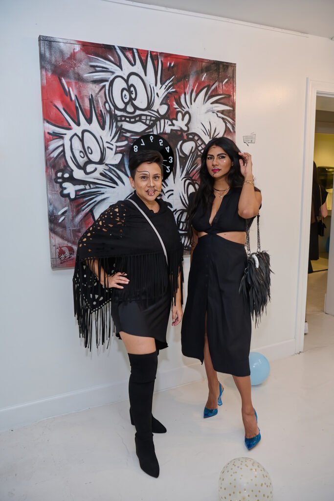 Claudia Diaz, Aisha Khan at the "Frenchies & Friends" opening celebration at Alliance Française de Houston. (Photo by Charlie Horse Photography)