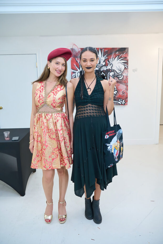 Karla Modesto, Krista Davenport at the "Frenchies & Friends" opening celebration at Alliance Française de Houston. (Photo by Charlie Horse Photography)