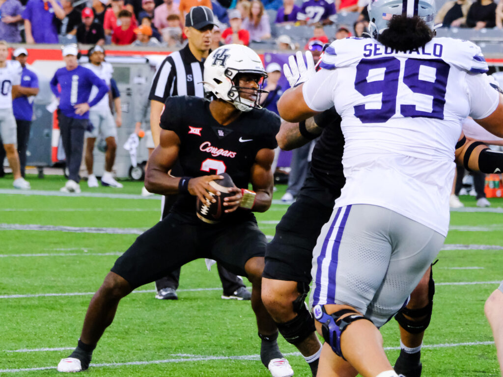 University of Houston quarterback Zeon Chriss is hard to catch once he gets going.  (Photo by F. Carter Smith)