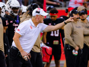 UH football head coach Willie Fritz leads the University of Houston Cougars to an upset victory over 17-th ranked Kansas State on a rainy Saturday afternon in TDECU Stadium