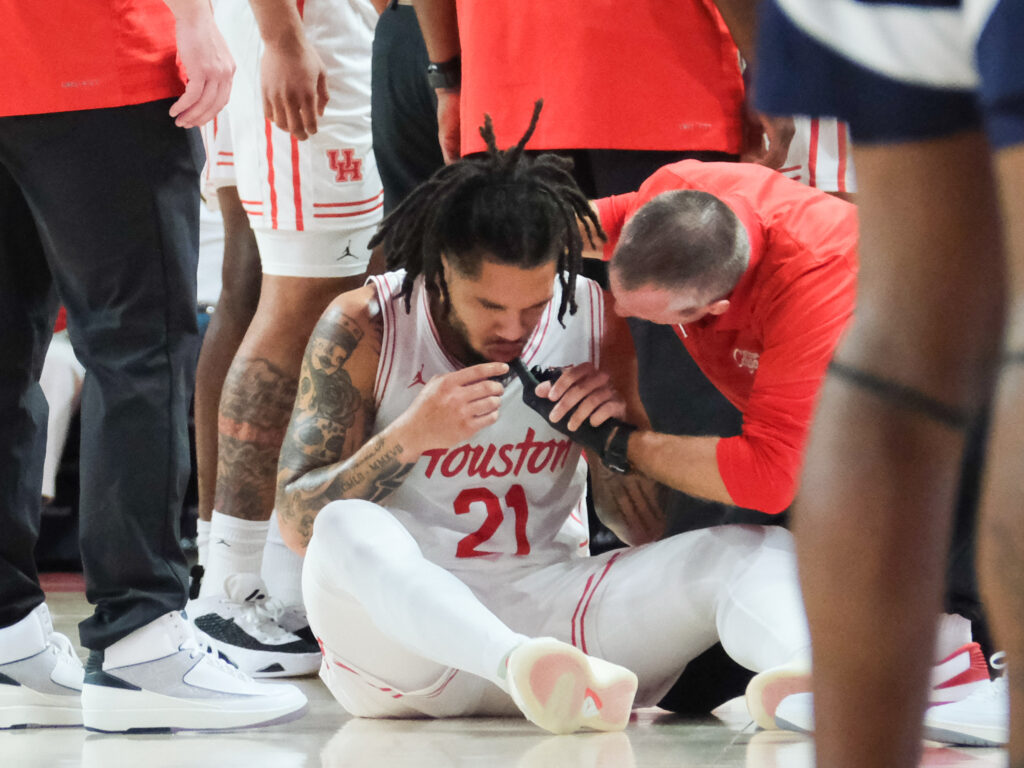 University of Houston guard Emanuel Sharp took a swinging elbow to the nose. (Photo by F. Carter Smith)