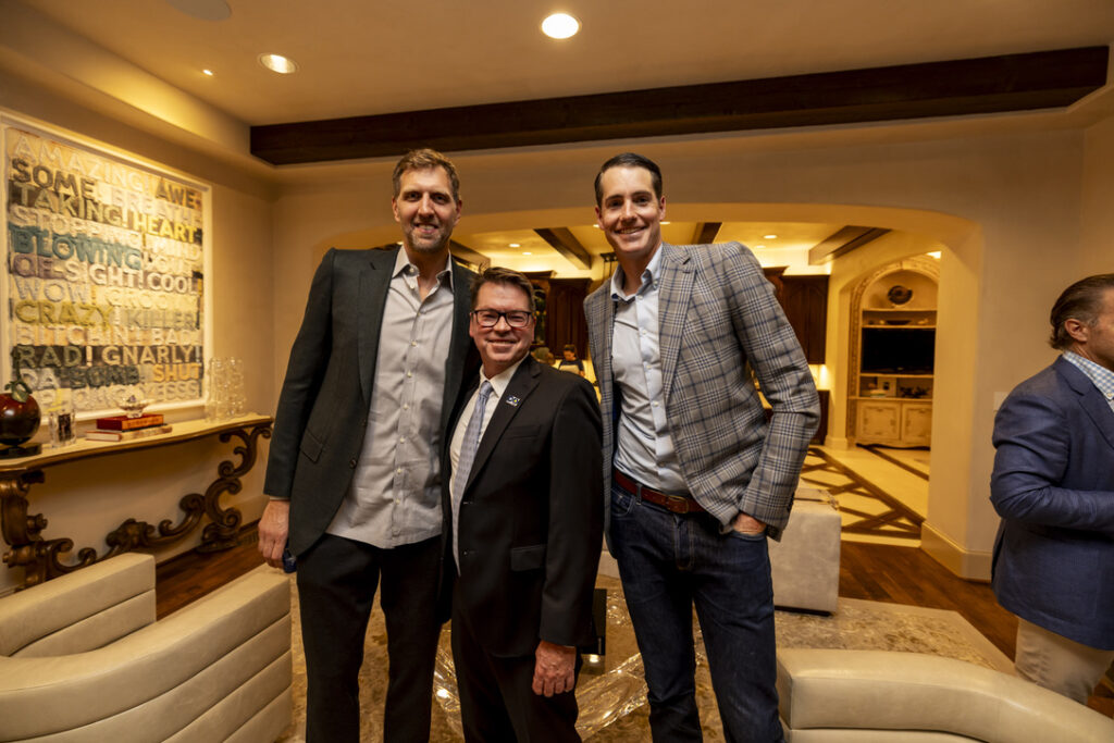 Dirk Nowitzki, Peter Lebedevs, and John Isner (Photo by Corey Wernecke)
