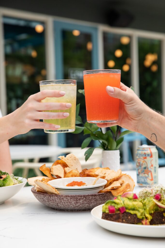 Cheers! Local Foods Market offers a selection of varied wines at approachable prices, ciders and canned spirit-free drinks. (Photo by Julie Soefer)