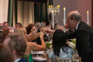 Evan Katz toasting to 100-years; Photo by Jenny Antill