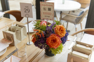 Floral centerpiece by by Mitra at Bellissimi Fiori (Photo by Tamytha Cameron)