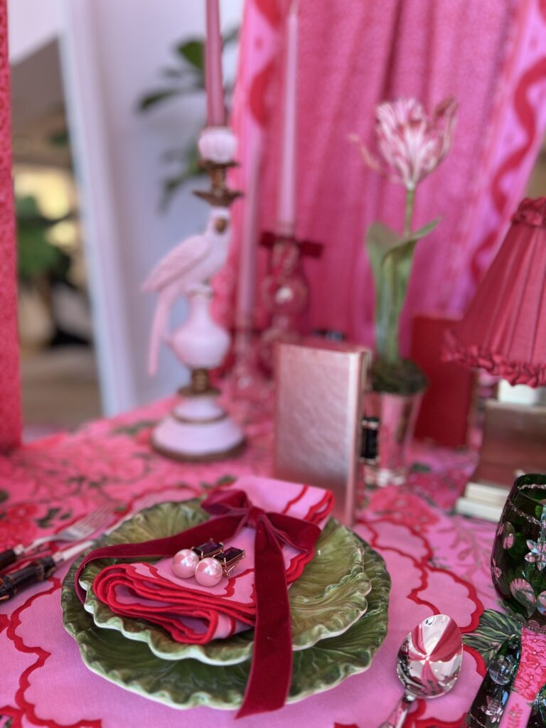 A stunning table in signature Carolina Herrera Pink and Red and Mrs. Alice Ikat. (Courtesy)