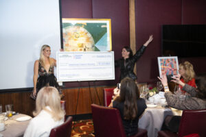 Lora Farris and Marjon Henderson reveal that $7.1 million was raised for American Cancer Society. (Photo by Tamytha Cameron)