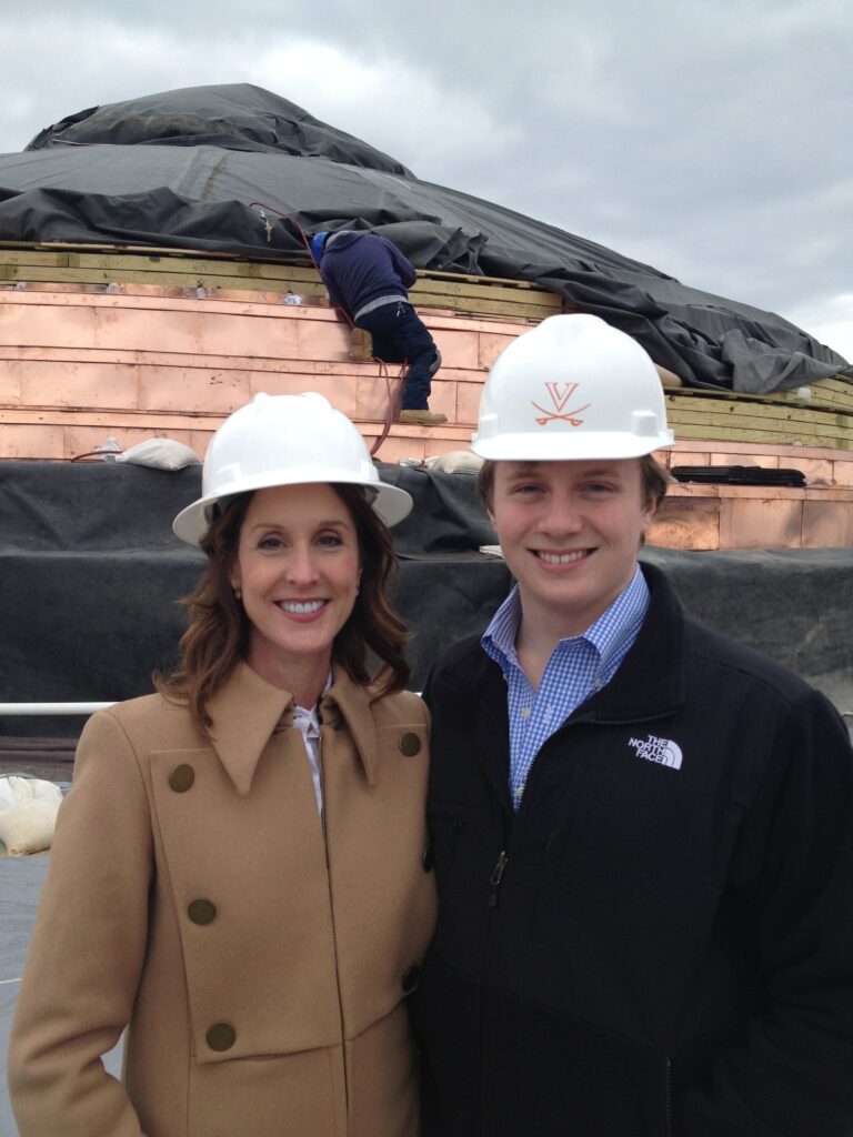 Phoebe Tudor and son, Harry Tudor, 
during restoration of the rotunda at the University of Virginia., where she assisted with the project. 