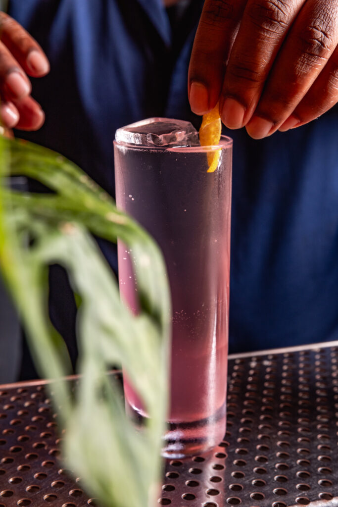 A favorite cocktail on Rye's menu, the Cherry Blossom & Coconut features lychee cordial, gin, and soda. (Photo by Samantha Marie)