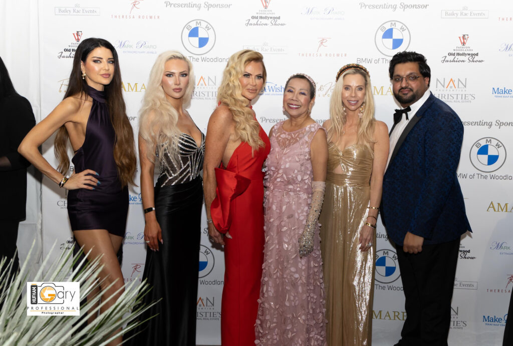 Theresa Roemer (in red) and guests enjoyed a night of high fashion in The Woodlands.