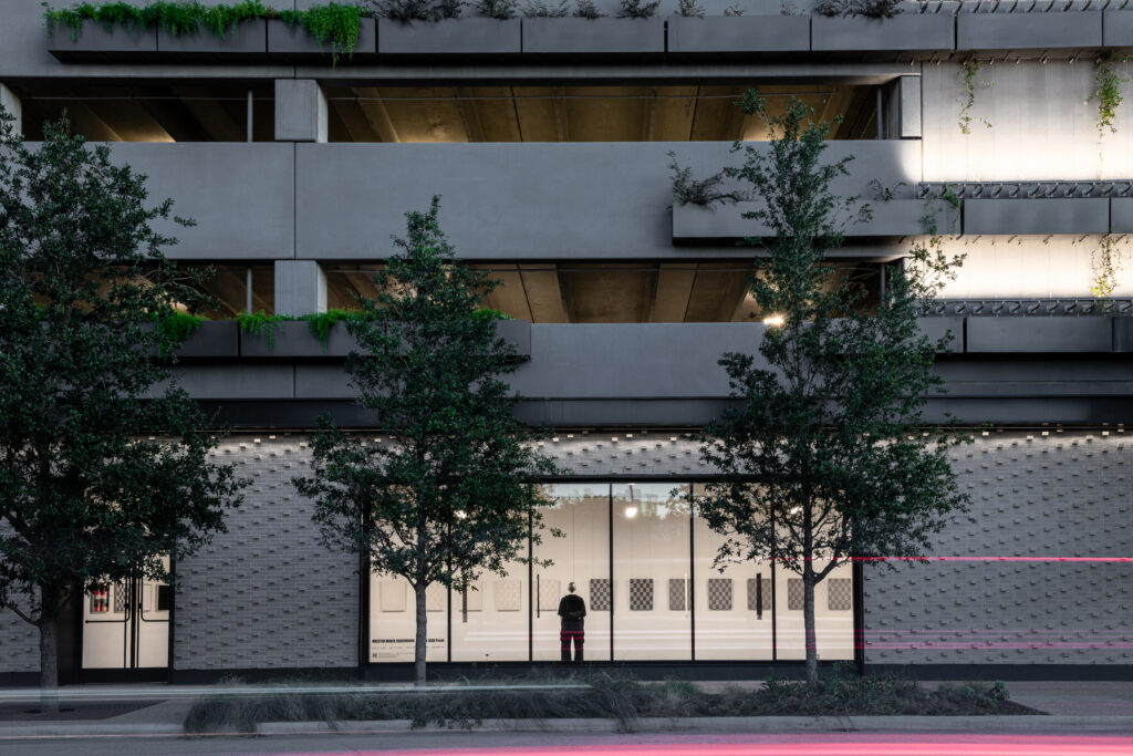 Kristin Marie Bachmann gazes at the works she crafted for "At The Still Point [Part 3]" at the Ion. (Photo by Paul Hester)