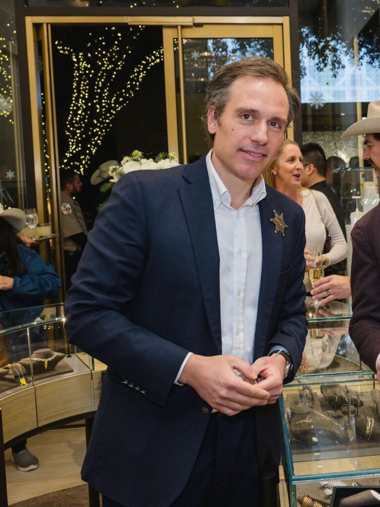 Jeweler Giorgio Bulgari introduces his latest in the Giorigo B collection at the festive de Boulle holiday party. (Photo by Johnny Than)