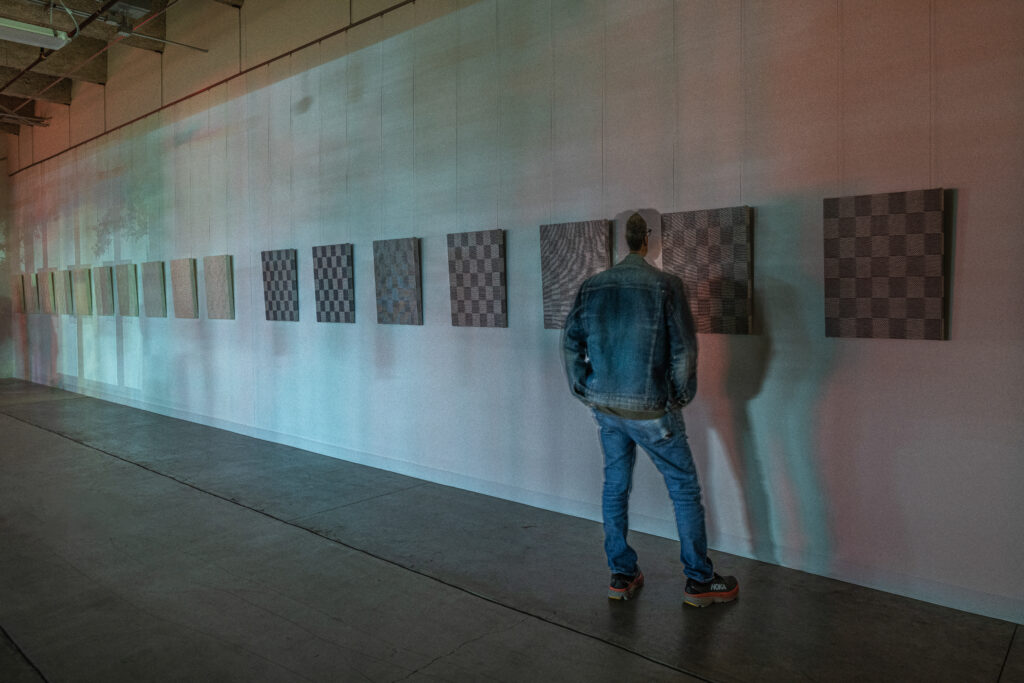 Experience the shadows and mind-bending twists of Kristin Marie Bachmann's works at night in "At The Still Point [Part 3]." (Photo by Paul Hester)