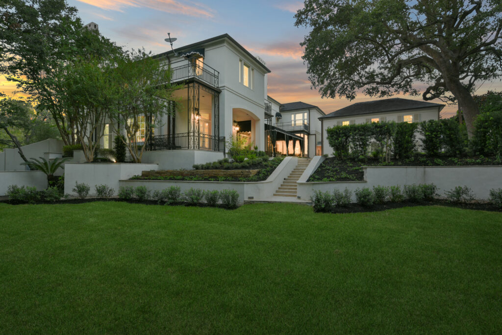 The tiered backyard at 1069 Kirby Drive wheren the 9,256 sq.ft. mansion rises across more than half an acre