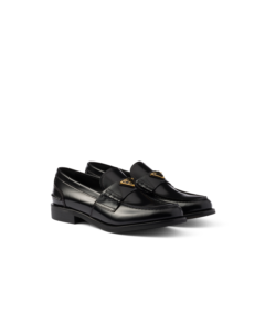 Prada brushed leather loafers,  $1,200, available at the Prada boutique