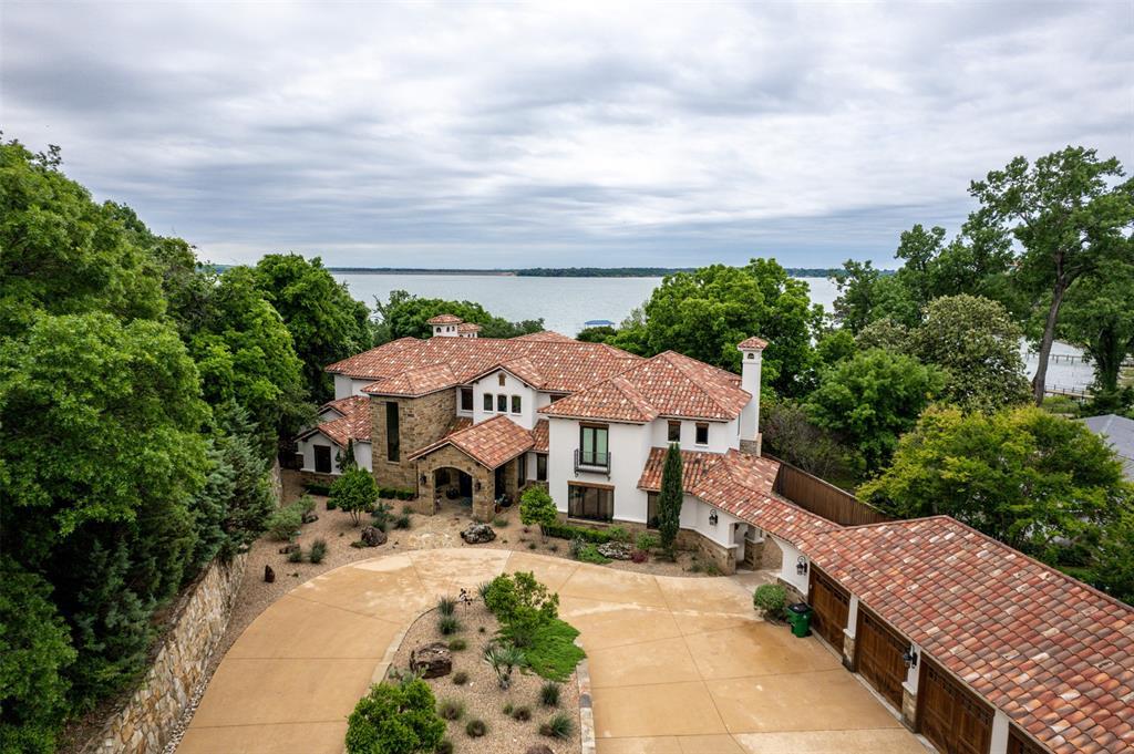 Located on Eagle Mountain Lake, “Eagle Manor” consists of three separate homes on over 5.5 acres, making it the lake house that everyone will love visiting.