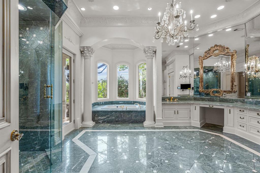 At 4400 Overton Crest Street, there are five bedrooms and six and a half baths across the 11,790-square-foot home.