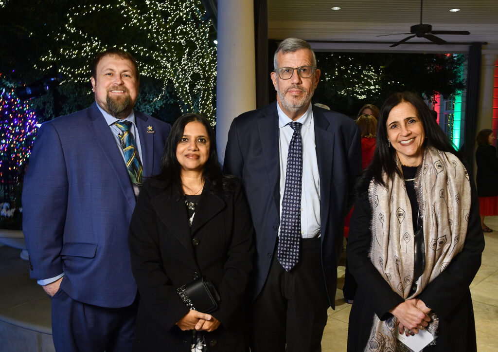 Aaron Walton, Dr. Vidya Gopalakrishnan, Dr. Richard Gorlick, Dr. Nancy Gordon at the Santa's Elves party benefiting the MD Anderson Children's Cancer Hospital
