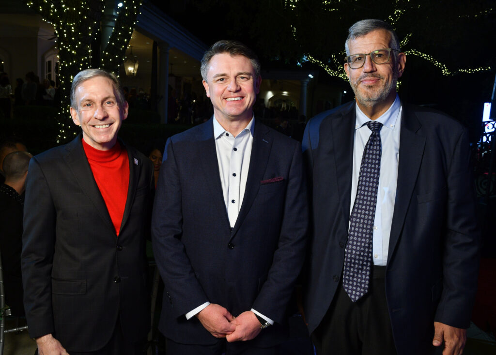 Dr. Peter Pisters, Chris McKee, Dr. Richard Gorlick at the Santa's Elves party benefiting the MD Anderson Children's Cancer Hospital