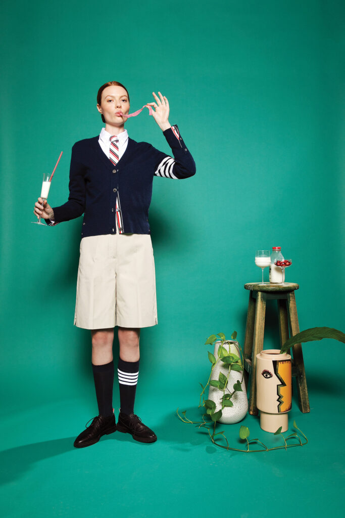 Thom Browne Mr. & Mrs. Thom holiday cardigan $1,490, Oxford shirt $490, stripe tie $350, twill chino shorts $470, four-bar socks $120, and heeled Longwing brogue $1,340, at Forty Five Ten, Neiman Marcus, farfetch.com, modaoperandi.com, net-a-porter.com.
MOUS Haven vase $495, at MOUS.
Serax X Kelly Wearstler red wine glass $132, champagne flute $128, and champagne coupe $146, at The Conservatory.
Greg Natale Visage vase $270, at Forty Five Ten.
 (Photo by Tony Solis)