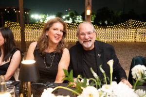 Barbara McKnight and Bob Cavnar at the Delicious Alchemy Banquet 2024 at Hope Farms HTX to benefit Recipe for Success Foundation