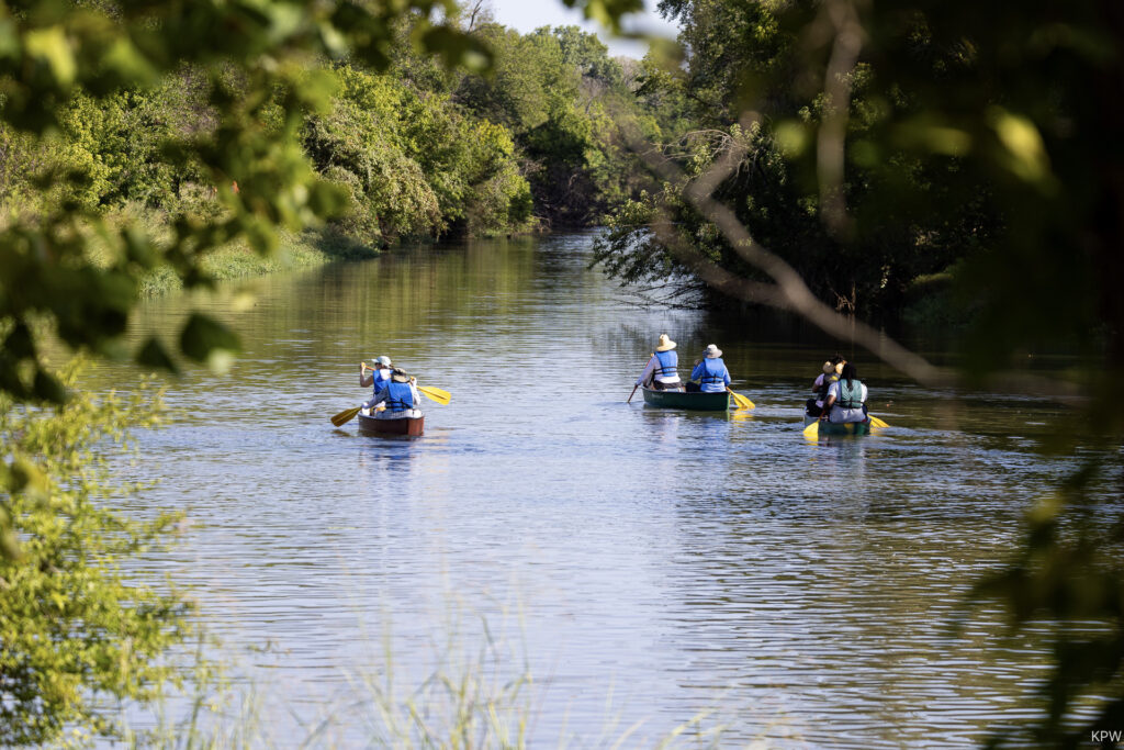 A group of paddlers cruises through the Fort Worth Nature Center and Refuge. (Photo by K.P. Wilska)