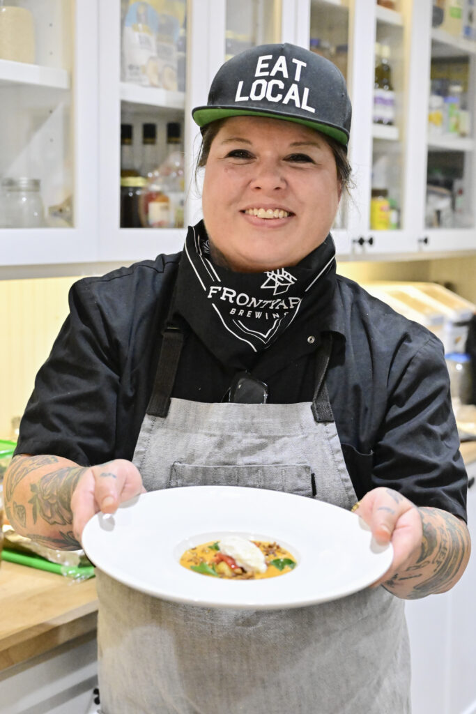 Chef Jane Wild of Jane Wild Studio cooks at at the 19th Delicious Alchemy Banquet benefiting Recipe for Success Foundation. (Photo by Michelle Watson)