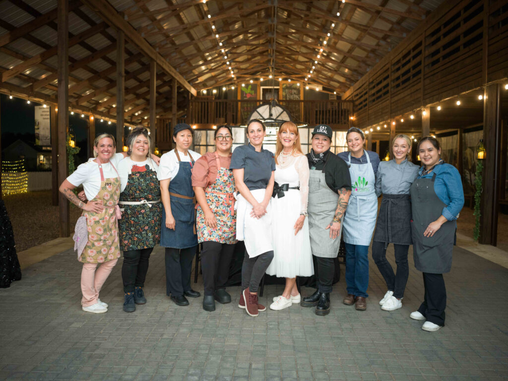 Recipe for Success founder Gracie Cavnar with the chefs participating in the 19th Delicious Alchemy Banquet benefiting Recipe for Success Foundation. (Photo by Daniel Ortiz)