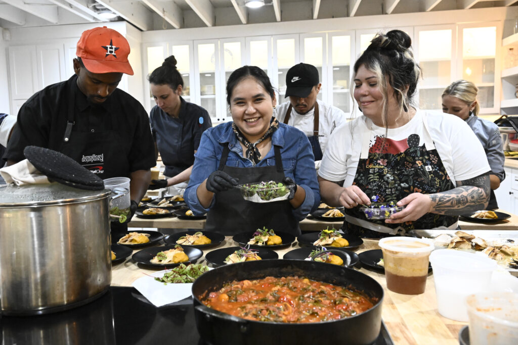 Chefs in the kitchen at Hope Farms for the 19th Delicious Alchemy Banquet benefiting Recipe for Success Foundation. (Photo by Michelle Watson)