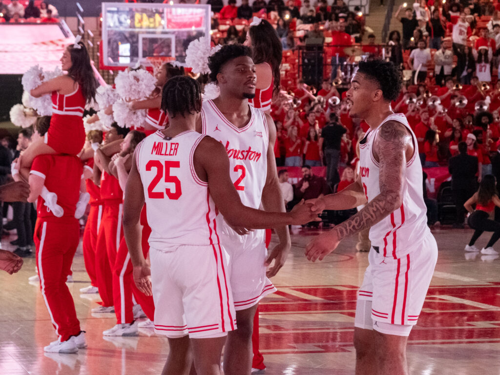 University of Houston players Mercy Miller, Cedric Lath and Ramon Walker Jr. help power a deep bench. (Photo by F. Carter Smith)