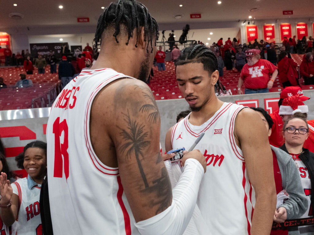 University of Houston forward J'Wan Roberts will always support teammates like Milos Uzan. (Photo by F. Carter Smith)