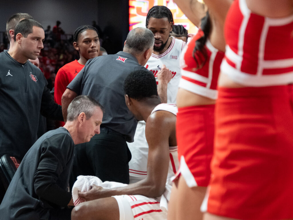 University of Houston coach Kelvin Sampson and veteran forward J'Wan Roberts both bring plenty of fire. (Photo by F. Carter Smith)