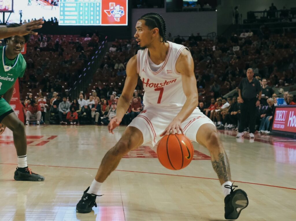 New starting Houston point guard Milos Uzan is filling big shoes. (Photo by F. Carter Smith)