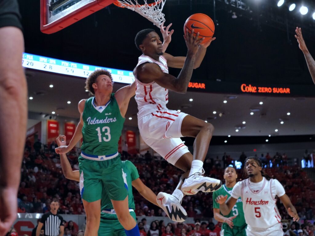 Terrance Arceneaux is a creative finisher at the rim for Houston. (Photo by F. Carter Smith)