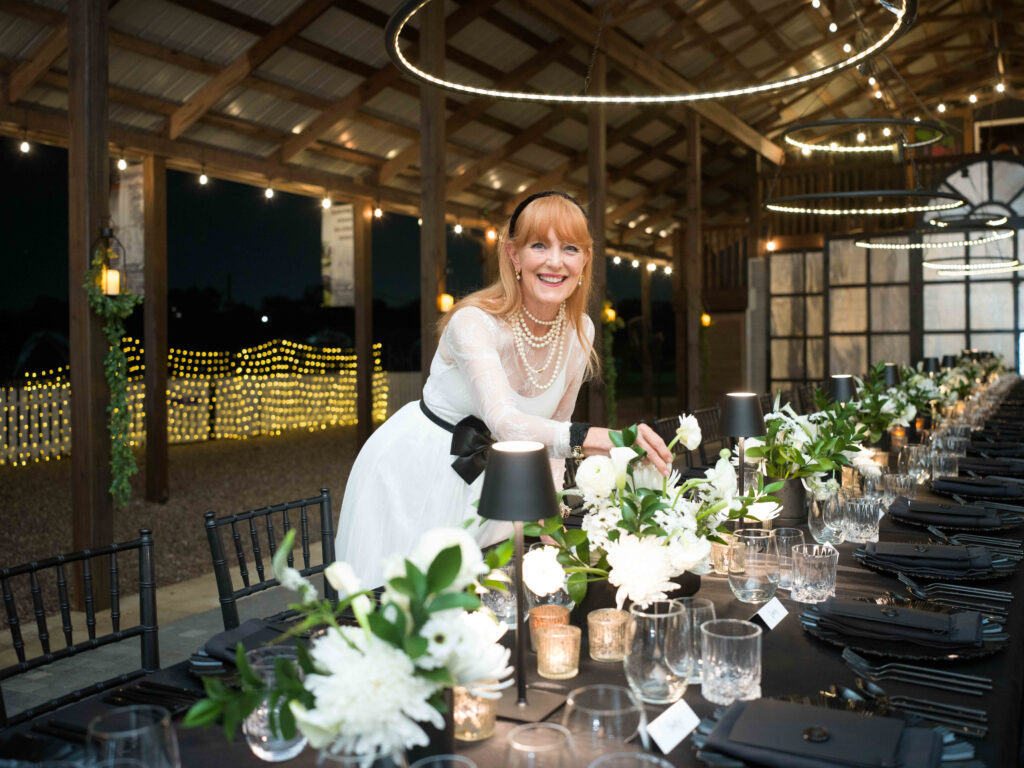 Recipe for Success Foundation founder Gracie Cavnar readying for the 19th Delicious Alchemy Banquet at Hope Farms. (Photo by Daniel Ortiz)
