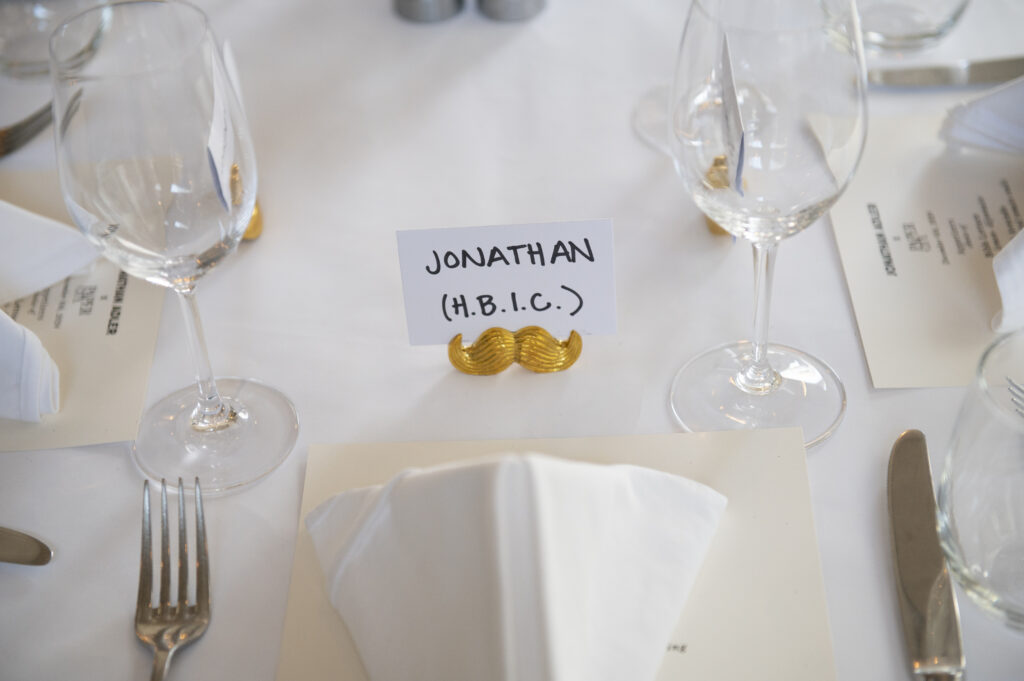 A cheeky place card indicates the man of the hour. (Photo by Tamytha Cameron Photography)
