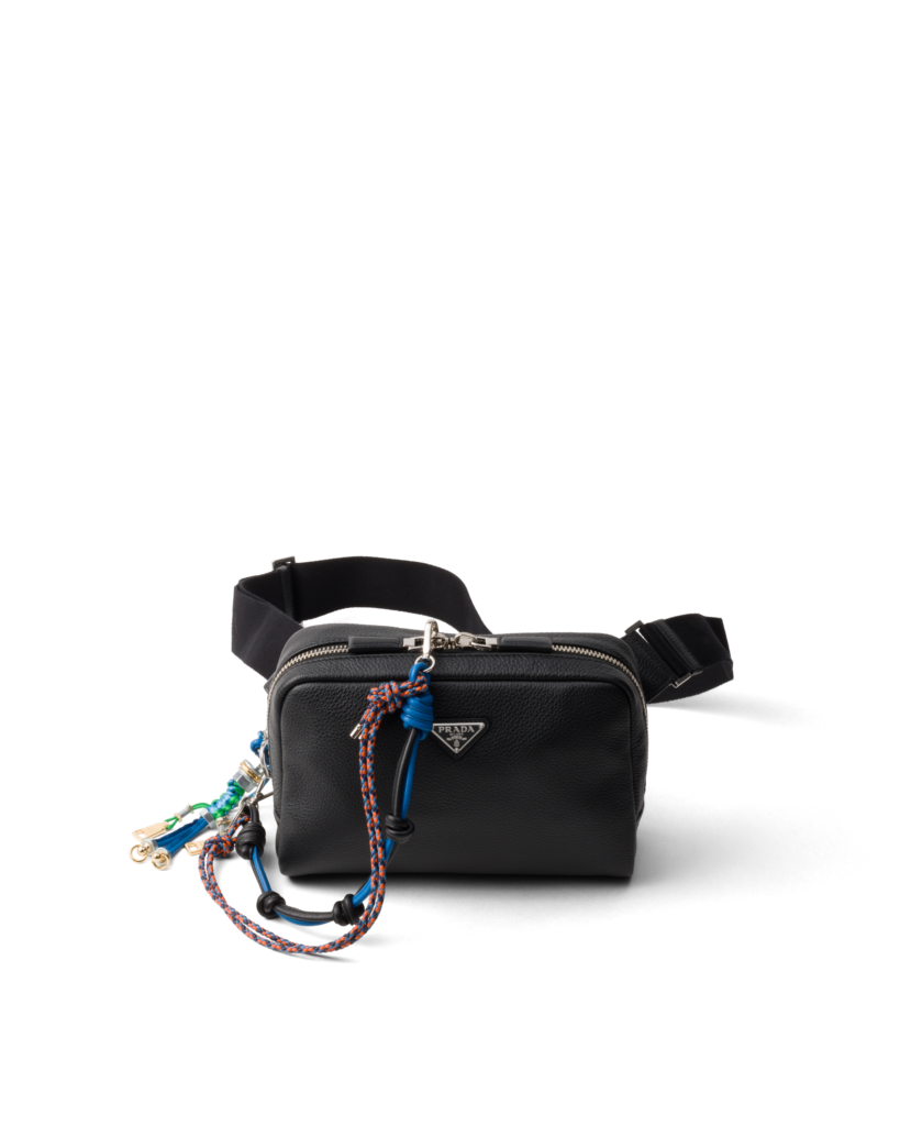 Prada leather shoulder bag with charm, 
$3,350, available at the Prada boutique.