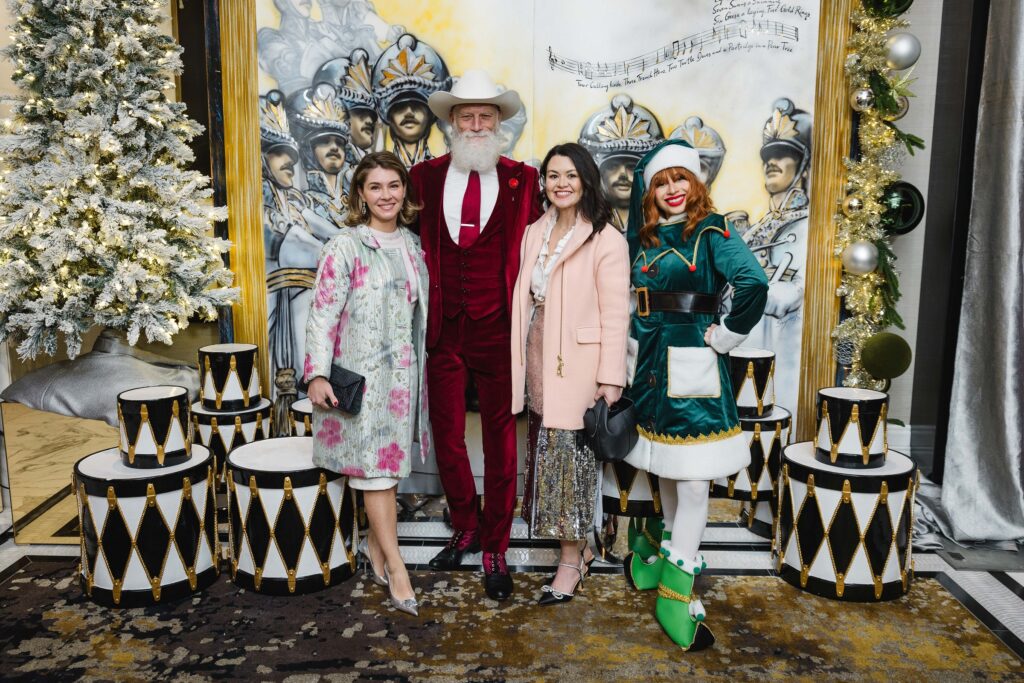 Rachael Volz, Fashion Santa, Melissa Clark, holiday elf at the Ambassadors for Texas Children's Hospital holiday party. (Photo by Jenny Antill)