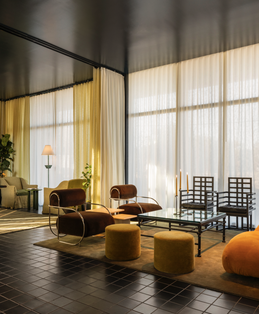 The Hotel Saint Augustine lobby with dramatic floor-to-ceiling curtains reminiscent of those at  John and Dominique de Menil's Houston home.   (Photo by Julie Soefer)