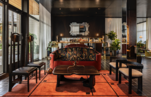 A glass atrium area leads to the Hotel Saint Augustine lobby bar and lounge. (Photo by Julie Soefer)