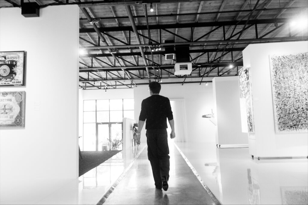 Tanner Ewing walks into the role of a gallerist. (Photo by Will Von Bolton)