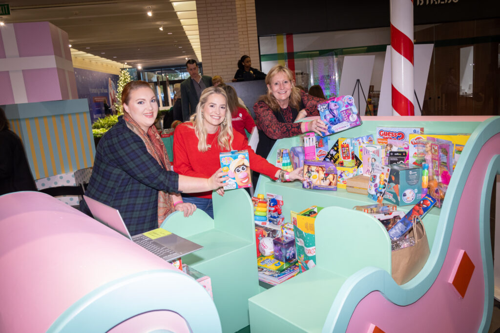 Women’s Auxiliary Members filled up the sleigh with donated toys. (Photo by Kim Leeson)