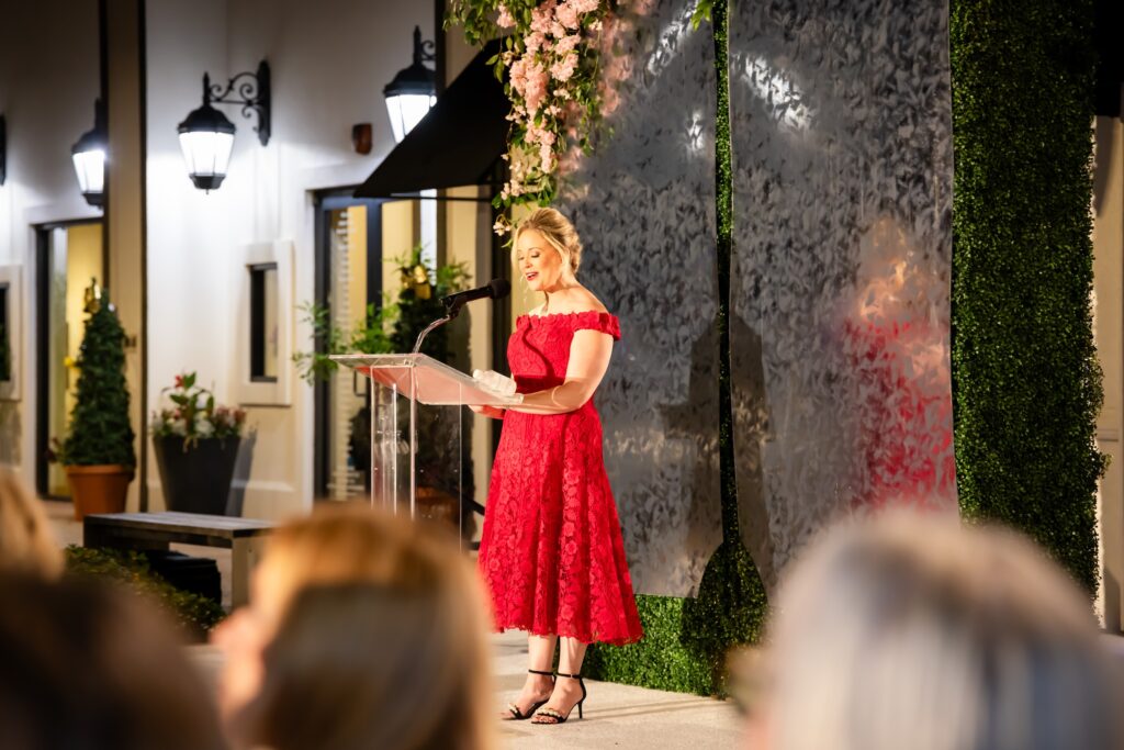 Emcee Maggie Flecknoe at the Elizabeth Anthony  annual fashion evening benefiting the American Heart Association (Photo by Christina Griffin)